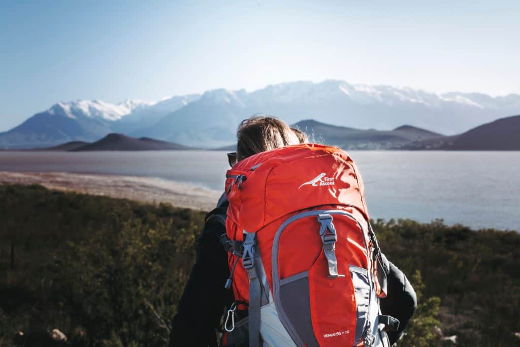 Hiker with a backpack in the mountains