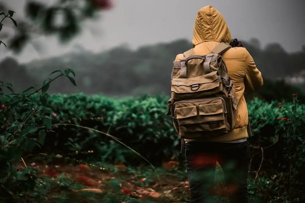 Hiker wearing a tough jacket while raining